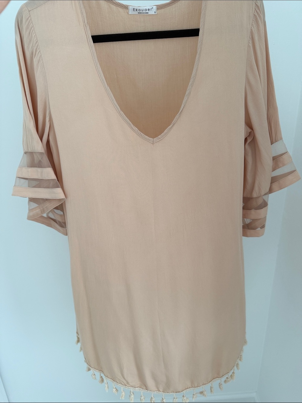 Beige swim suit coverup with tassel detail